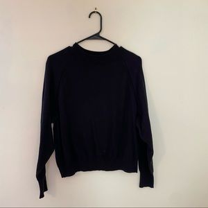 A New Day black sweater